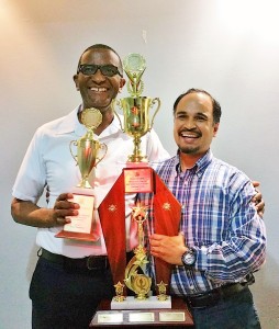 Roger and Father Gregory with the Math Olympiad trophies
