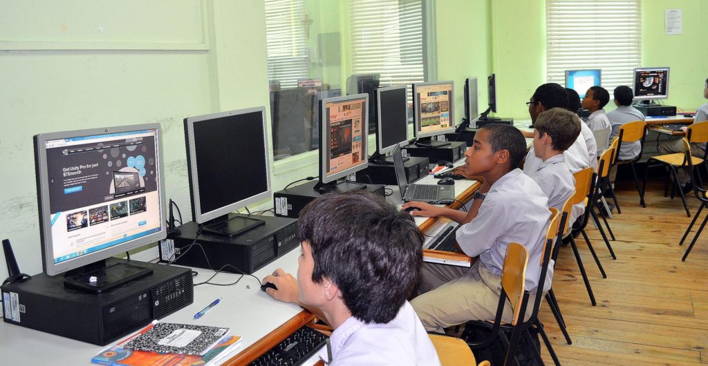 Fatima college students utilizing the new donated computers in the school’s computer lab