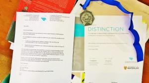 The medal and certificate awarded to Fatima College in 2015 for placing in the top 25% out of 16,000 international students who wrote the University of Waterloo's Euclid Mathematics Contest. Fatima obtained a ranking of 111 out of 1300 schools.